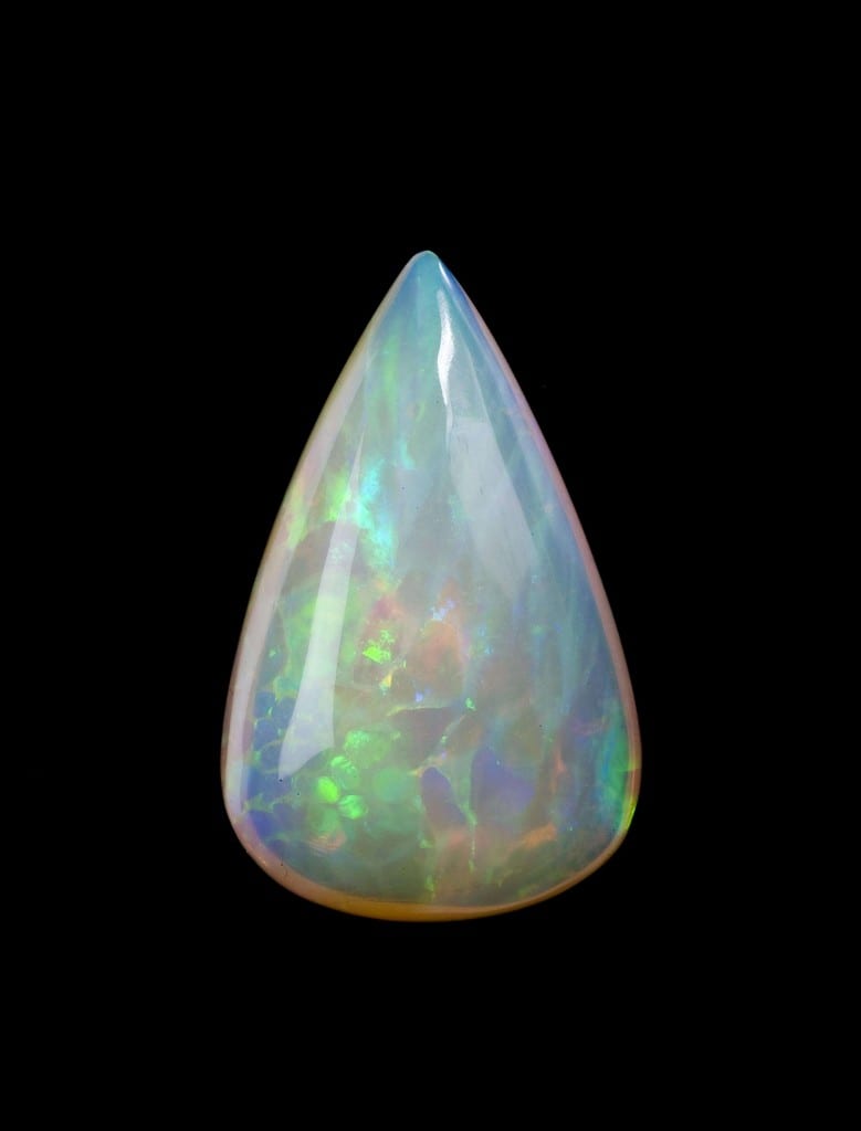 This 15.5-carat double cabochon opal has a flash of colors across its entire face. “Opal,” Tsehay Mewcha, Wollo, Welo Province, Ethiopia. © Rob Lavinsky, www.iRocks.com. Used with permission.