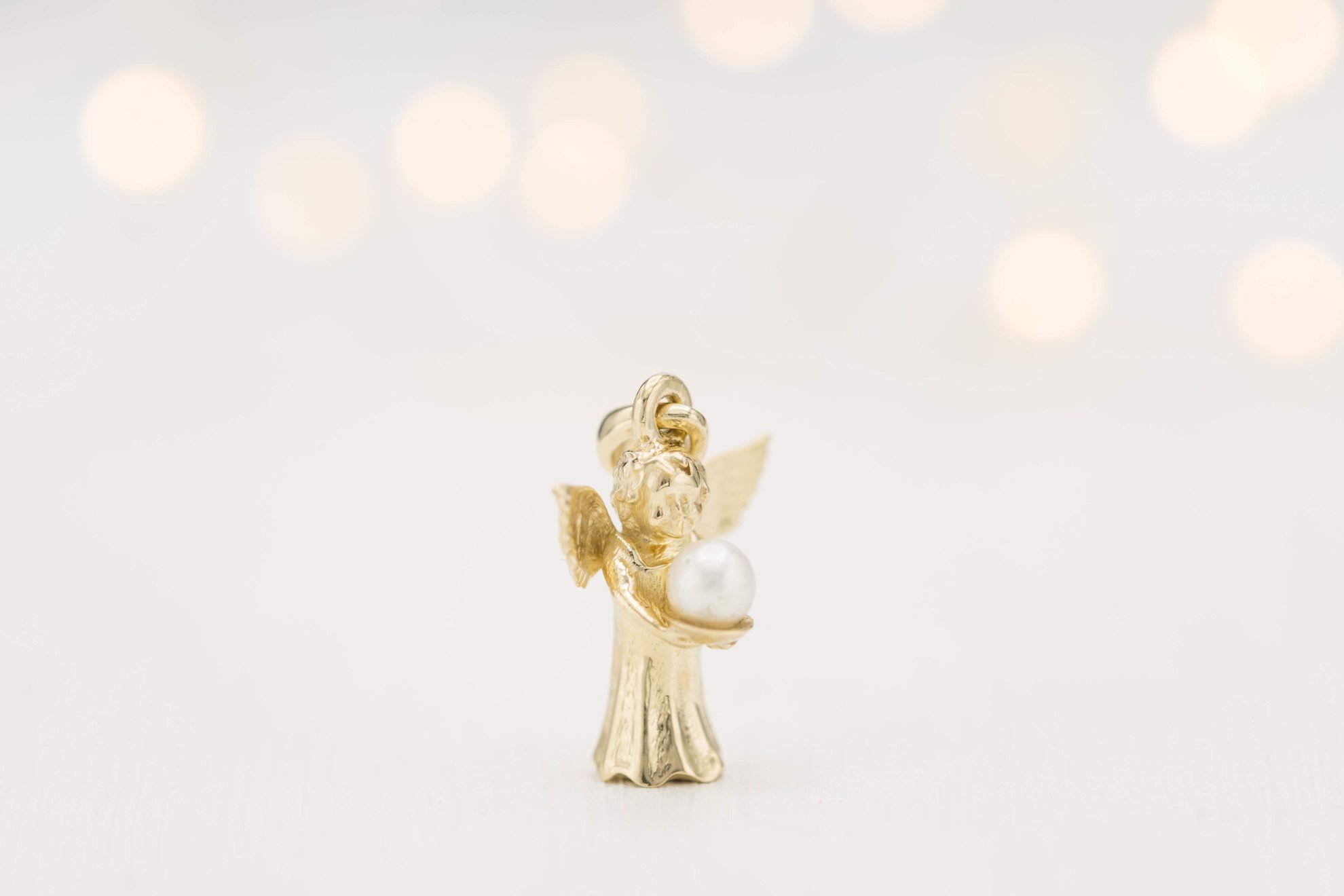 angel pendant with pearl
