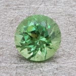 Finished version of Fancy Round Brilliant Cut Grossular Garnet