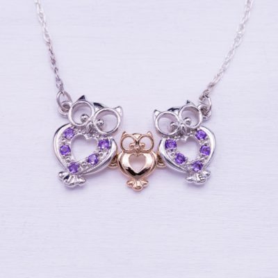 amethyst pendant with owl motif