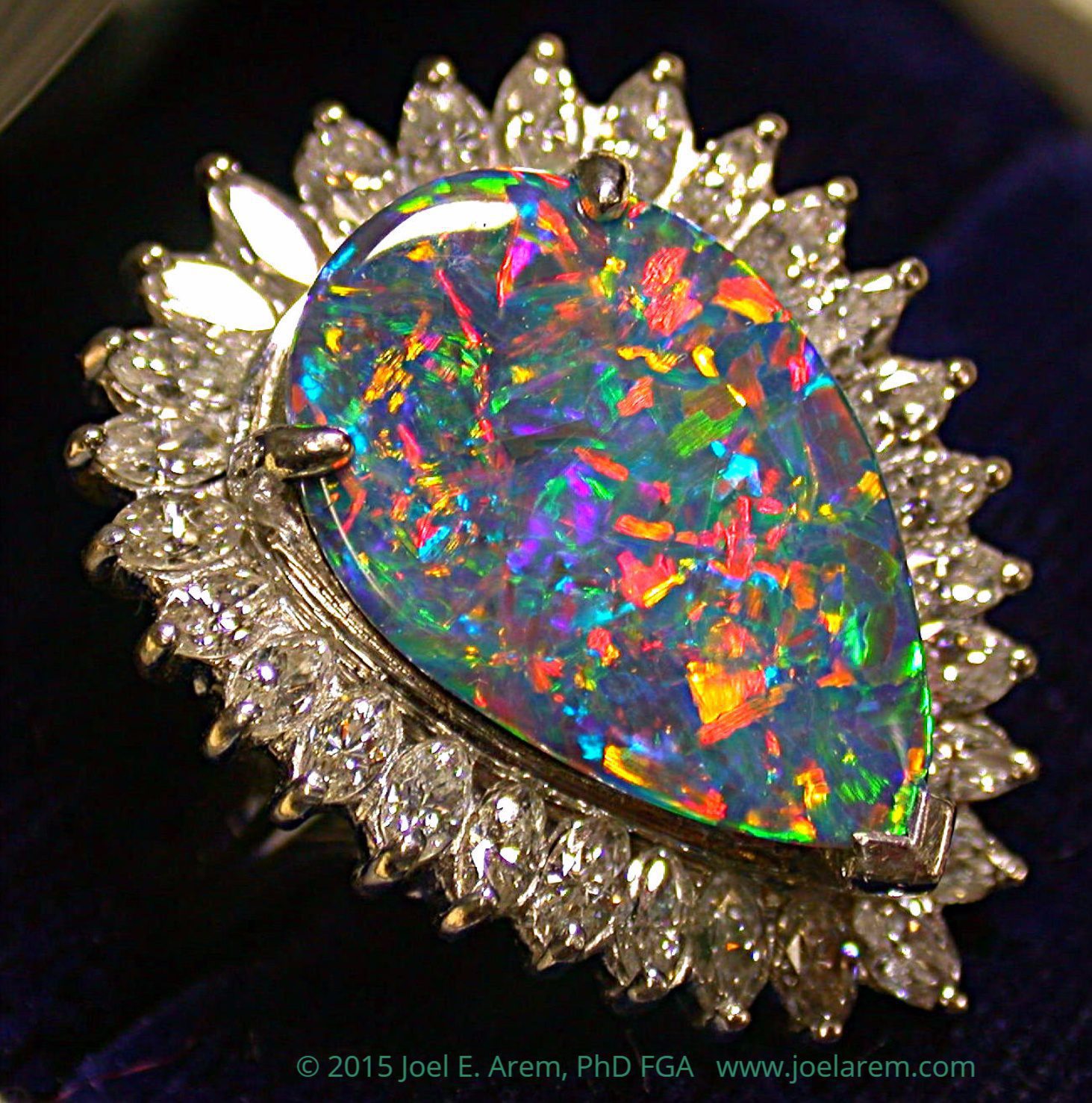 Harold Jaffe Jewelers custom made 18k yellow gold, black opal and fire opal  ring | Harold Jaffe Jewelers