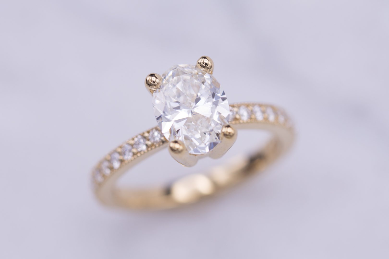 1.5 carat Oval and 1 carat Round Diamond Duo Ring