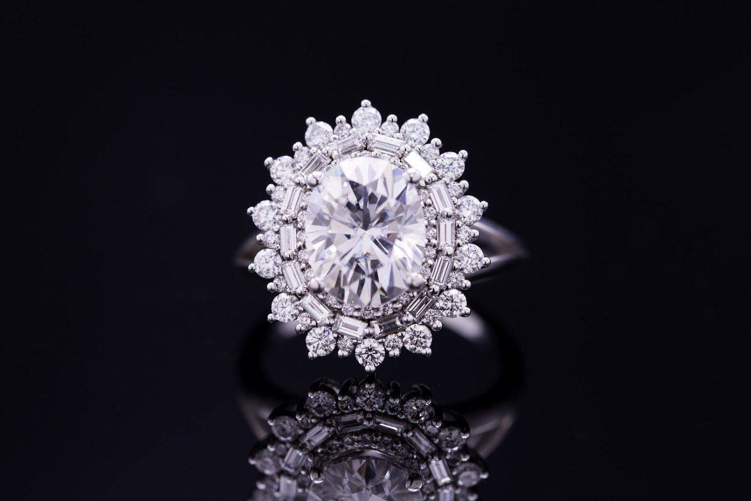 five-carat diamond - moissanite oval engagement ring