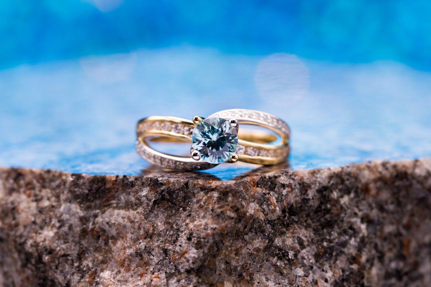 engagement ring setting - blue zircon channel-set diamonds