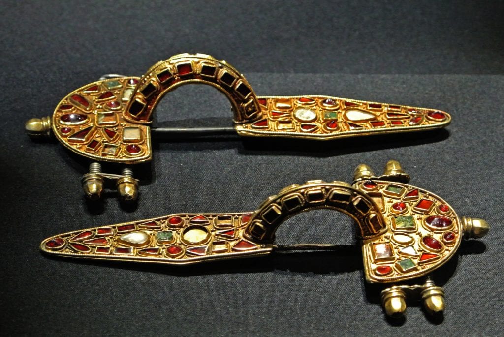 Roman brooch with garnet inlay - garnet symbolism and legends
