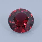 Finished version of Round Brillliant Cut Rhodolite Garnet