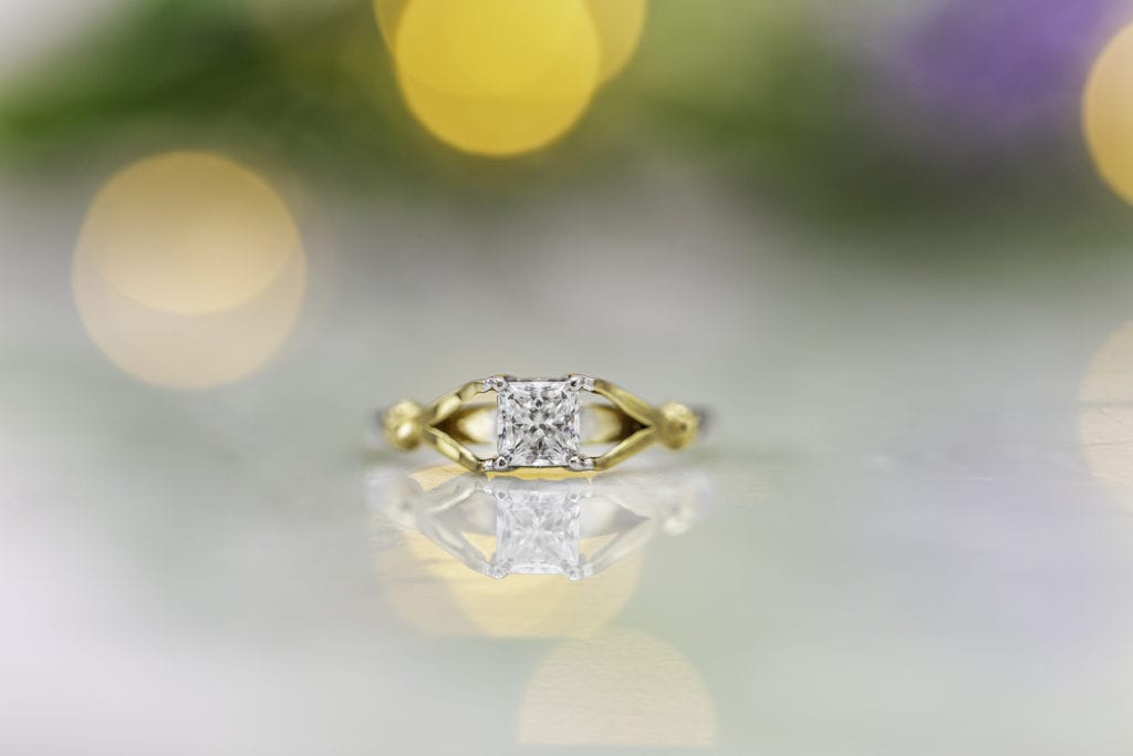 split shank engagement ring with radiant-cut diamond