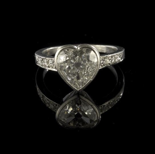 bezel-set heart-cut diamond engagement ring