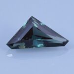 Finished version of Custom Triangular Freeform Cut Sapphire
