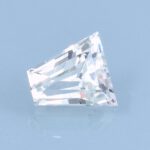 Finished version of Keystone or Short Tapered Baguette Cut Leuco Grossular Garnet