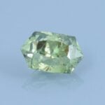 Finished version of Custom Cushion Hexagon Cut Demantoid Garnet