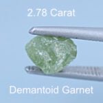 Rough version of Custom Cushion Hexagon Cut Demantoid Garnet