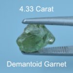Rough version of Custom Brilliant Oval Cut Demantoid Garnet